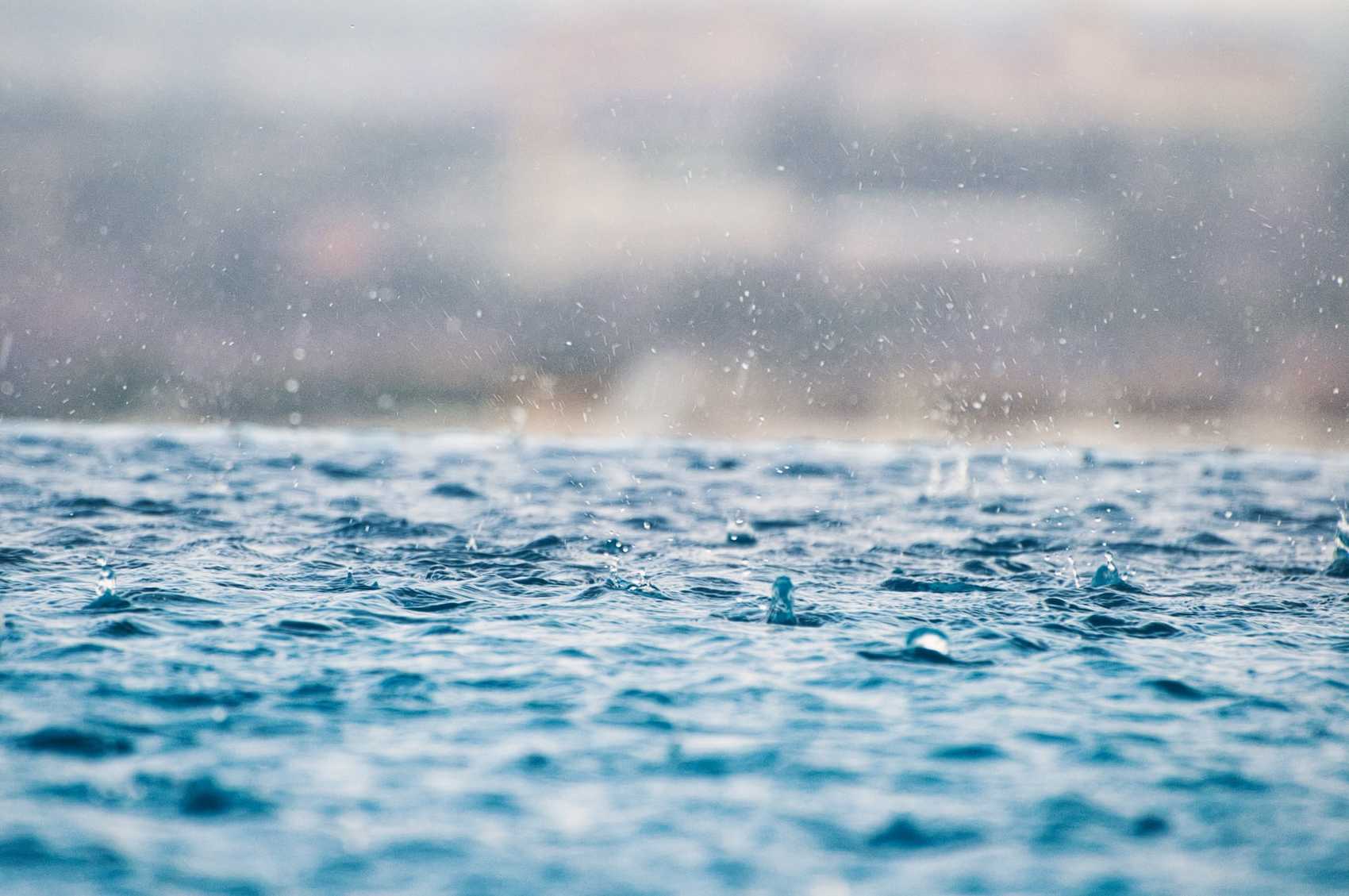 Rain dropping into lake